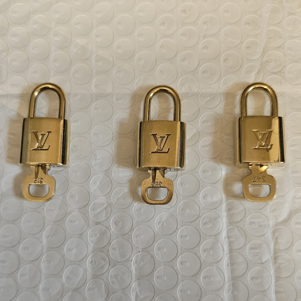 Louis Vuitton Lock & Key #319 Listing for 1 item only